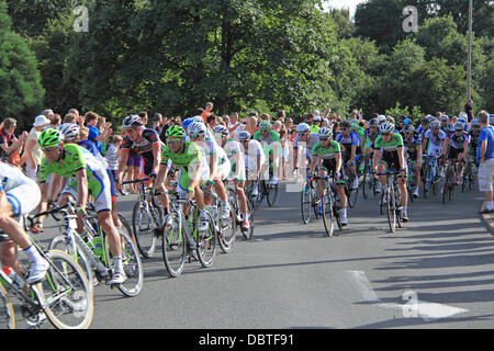 Prudential RideLondon London-Surrey Classic. Sunday 4th August 2013. 150 top international professional cyclists compete around a 137.2mile circuit which roughly follows the London 2012 Olympic Road Race route. Peloton at the Scilly Isles, Esher, Surrey, England, UK. Credit:  Ian Bottle/Alamy Live News Stock Photo