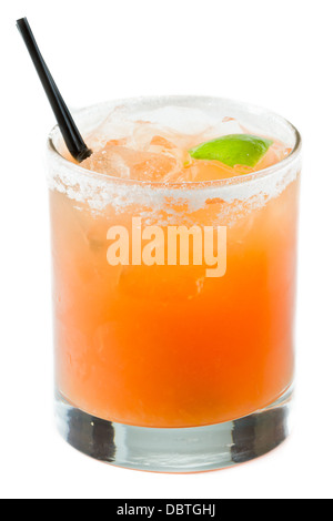 blood orange margarita isolated on a white background garnished with a sugar rim and a lime wedge Stock Photo
