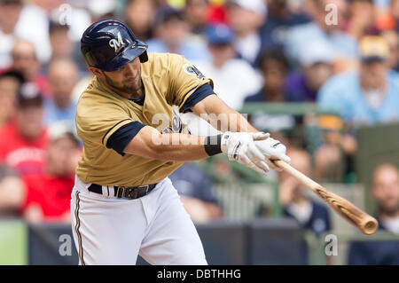 Milwaukee, Wisconsin, USA. 4th Aug, 2013. August 4, 2013: Milwaukee Brewers third baseman Jeff Bianchi #14 singles in two runs in the 6th inning during the Major League Baseball game between the Milwaukee Brewers and the Washington Nationals at Miller Park in Milwaukee, WI. Brewers lead the Nationals 6-5 in the 7th inning. John Fisher/CSM. Credit:  csm/Alamy Live News Stock Photo
