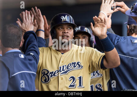 Milwaukee, Wisconsin, USA. 4th Aug, 2013. August 4, 2013: Milwaukee Brewers first baseman Juan Francisco #21 is congratulated after scoring in the 6th inning during the Major League Baseball game between the Milwaukee Brewers and the Washington Nationals at Miller Park in Milwaukee, WI. Brewers lead the Nationals 6-5 in the 7th inning. John Fisher/CSM. Credit:  csm/Alamy Live News Stock Photo