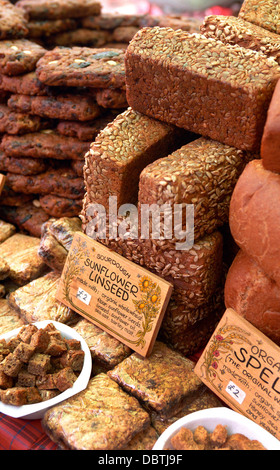 Organic bread on sale at a market in Totnes, Devon, UK. Stock Photo
