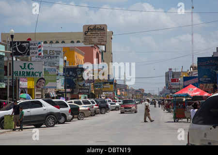 The main street of Nuevo Progreso, Mexico, which is lined with shops and street vendors catering to tourists from Texas. Stock Photo