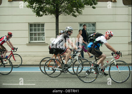 The Mall, London, UK. 04th Aug, 2013. The Mall, London, UK 4th Aug, 2013.  Riders completing the London Surrey 100 through the traffic-free roads of London, photographed from the media bus © Malcolm Park/Alamy Live News Credit:  Malcolm Park/Alamy Live News Stock Photo