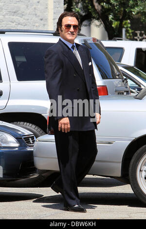 Frank Stallone seen trying on an army jacket in a parking lot in Beverly Hills Beverly Hills, California - 27.08.11 Stock Photo