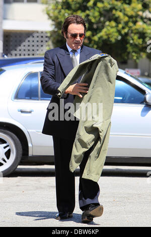 Frank Stallone seen trying on an army jacket in a parking lot in Beverly Hills Beverly Hills, California - 27.08.11 Stock Photo