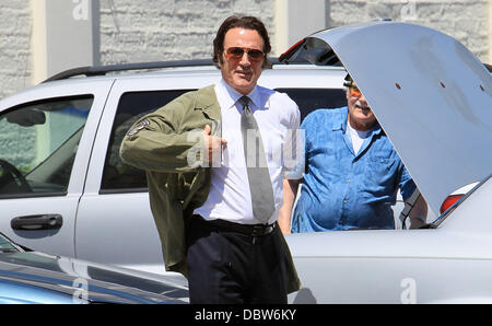 Frank Stallone seen trying on an army jacket in a parking lot in Beverly Hills Beverly Hills, California - 27.08.11 Stock Photo