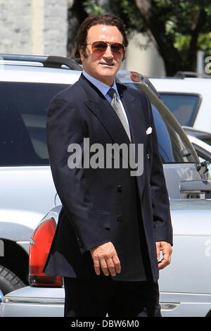 Frank Stallone seen trying on an army jacket in a parking lot in Beverly Hills Beverly Hills, California - 27.08.11 Stock Photo