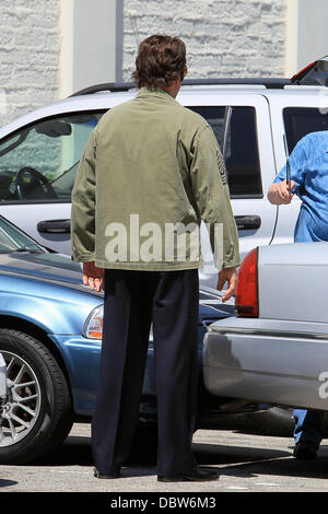 Frank Stallone seen trying on an army jacket in a parking lot in Beverly Hills Beverly Hills, California - 27.08.11 Stock Photo