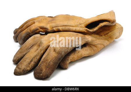 Old worn leather work / gardening gloves Stock Photo