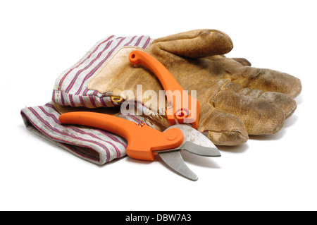 Pruning shears and gardening gloves cut out on white background Stock Photo