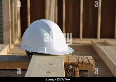 Hard hat safety helmet on a construction site, building site Stock Photo