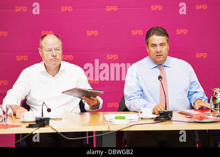 Berlin, German. 5th Aug, 2013. Peer Steinbrueck (SPD), SPD chancellor candidate, and Sigmar Gabriel (SPD), SPD party chairman, pictured together at the Meeting of the SPD Executive Committee at the headquarters of the SPD Party (Willy-Brandt-Haus) in Berlin. Credit:  Reynaldo Chaib Paganelli/Alamy Live News Stock Photo