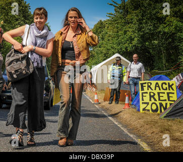 FILE PIX: CAROLINE LUCAS AT BALCOMBE FRACKING PROTEST. Balcombe, West Sussex, UK. 5th Aug, 2013. Caroline Lucas MP, the Green Party MP for Brighton Pavilion, and Vanessa Vine, an anti-fracking activist, attend the anti-fracking protests in Balcombe, West Sussex. Credit:  David Burr/Alamy Live News Stock Photo