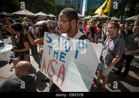 New York, New York. 04th Aug, 2013. Protesters in midtown Manhattan in New York demonstrate against the National Security Agency's surveillance of Americans' email and telephone conversations on Sunday, August 4, 2013. The protest was organized by a group called 'Restore the Fourth' referring to the Fourth Amendment of the Constitution which protects citizens against unreasonable searches by the government. Many citizens are opposed to the NSA activities and the events which took place around the country were called '1984 Day'. Credit:  Richard Levine/Alamy Live News Stock Photo