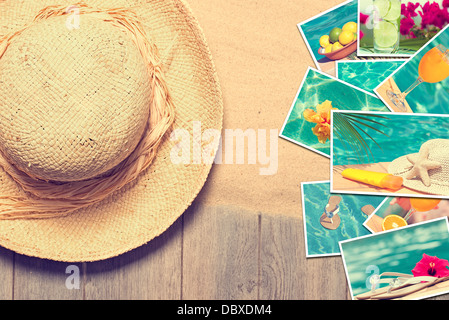 Straw sunhat with postcards of summer vacation Stock Photo