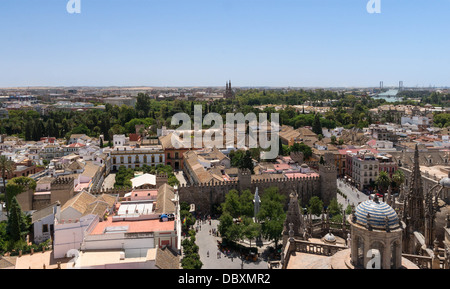 From Giralda, view of the walls of the 'Real Alcazar'. In background, the Guadalquivir river, Seville, Spain Stock Photo