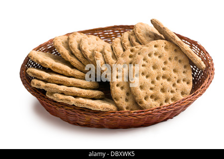 Crispbread in basket on white background Stock Photo