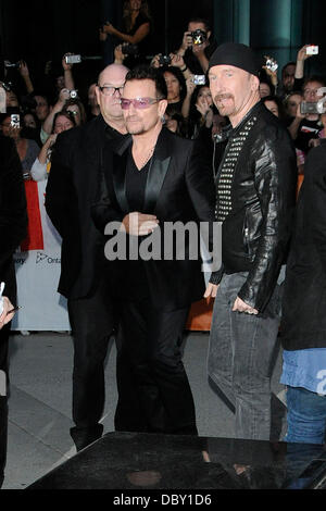 Bono and The Edge  'From The Sky Down' premiere arrival at The Roy Thomson Hall during  The 36th Annual Toronto International Film Festival.  Toronto, Canada - 08.09.11 Stock Photo