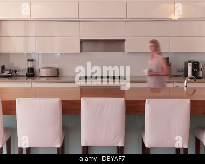 Modern kitchen with barstools Stock Photo