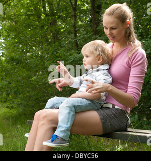 Happy mother and son having a nice day in the park Stock Photo