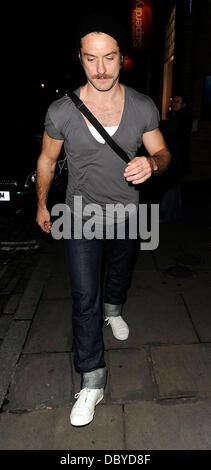 Jude Law sporting a moustache leaving the Donmar Warehouse after performing in 'Anna Christie' London, England - 13.09.11 Stock Photo