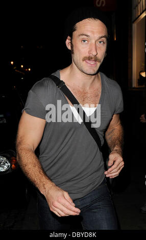 Jude Law sporting a moustache leaving the Donmar Warehouse after performing in 'Anna Christie' London, England - 13.09.11 Stock Photo