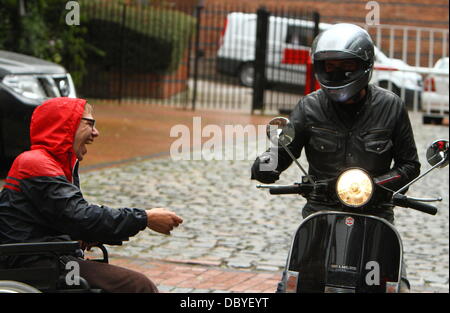 Chris Gascoyne arrives on a scooter 'Coronation Street' cast arriving at the Granada studios Manchester, England - 14.09.11 Stock Photo