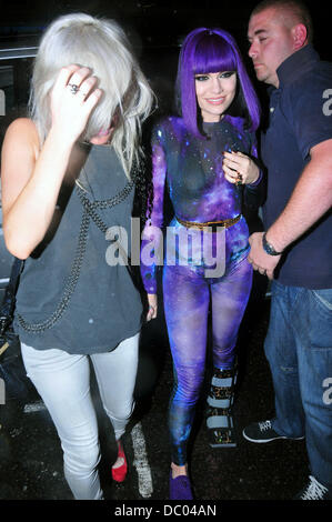 Ellie Gaulding and Jessie J aka Jessica Cornish leaving Sketch nightclub in a purple catsuit and still wearing a cast on her broken foot having performed at the club earlier in the evening.  London, England - 20.09.11 Stock Photo