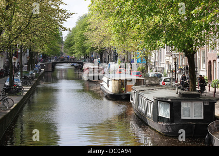 Amsterdam Netherlands Holland Europe houseboats on canal in Jordaan area Stock Photo
