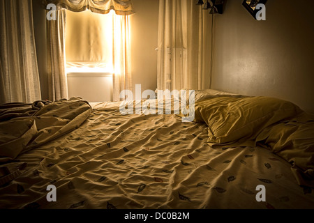 Early Morning Light Coming Through Bedroom Window Stock Photo