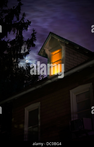 Spooky House With Moon At Night Stock Photo