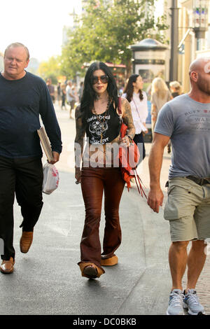 Kat Von D and her father Rene Drachenberg take a walk together at the Grove. Kat is not wearing her engagement ring after calling off her engagement with fiance Jesse James Hollywood, California - 25.09.11 Stock Photo