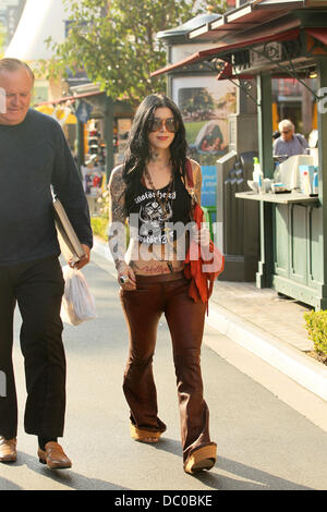 Kat Von D and her father Rene Drachenberg take a walk together at the Grove. Kat is not wearing her engagement ring after calling off her engagement with fiance Jesse James Hollywood, California - 25.09.11 Stock Photo