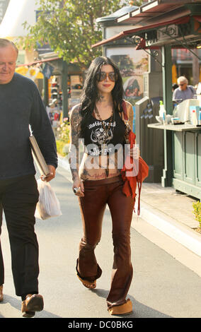 Kat Von D and her father Rene Drachenberg take a walk together at the Grove. Kat is not wearing her engagement ring after calling off her engagement with fiance Jesse James Hollywood, California - 25.09.11 Stock Photo