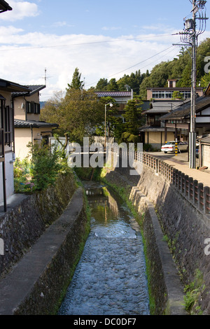 Enclosed stream in the backstreets of Takayama, Gifu Prefecture, Japan Stock Photo