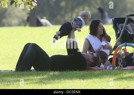 James Corden with baby Max enjoying the sunshine at a park in Primrose Hill. London, England - 28.09.11 Stock Photo