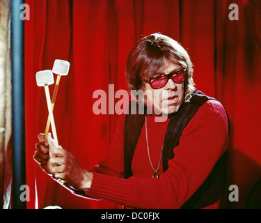 1960s 1967 MOTION PICTURE THE PRESIDENT'S ANALYST STAR JAMES COBURN PLAYING DRUMS Stock Photo