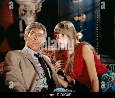 1960s 1967 MOVIE STILL OF JAMES COBURN AND JOAN DELANEY IN THE PRESIDENT’S ANALYST Stock Photo