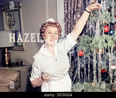 1960s 1961-1965 HAZEL TELEVISION SERIES SHIRLEY BOOTH SMILING DECORATION CHRISTMAS TREE WITH TINSEL Stock Photo