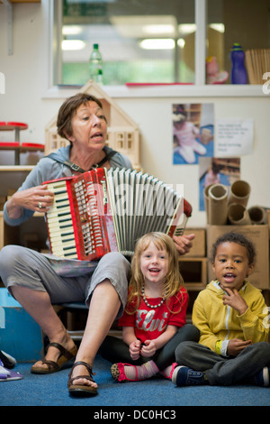 SPC. Stephania Ozokwere, vocalist, U.S. Army Europe and Africa Band and  Chorus shown here performing in front of local children, recently performed  the Greek Folk Song, Dance of Zalongo to commemorate Greek