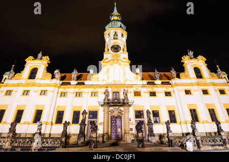 Loreta Sanctuary in Prague, with the Saints statues on the main entrance and with baroque bell tower Stock Photo