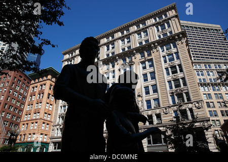 Silhouette of figures in the Irish Famine Memorial statue on the Freedom Trail in Boston, Massachusetts Stock Photo