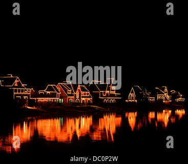 PHILADELPHIA PA BOATHOUSE ROW LIT UP AT NIGHT REFLECTING IN SCHUYLKILL RIVER Stock Photo