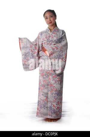 Japanese Lady Wearing a Pink and Lilac Patterned Kimono