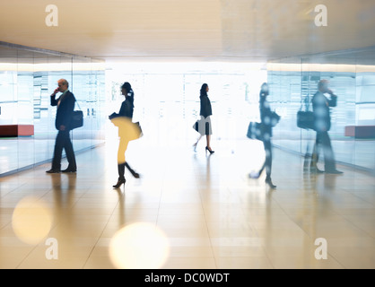 Business people in lobby Stock Photo