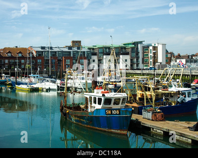 Boats berthed  at Camber Wharf in Portsmouth Stock Photo