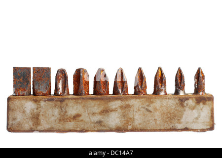 Some rusty screwdriver heads isolated on white Stock Photo