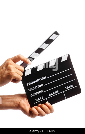Two hands holding a cinema clap isolated on white Stock Photo