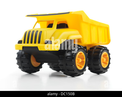 Yellow toy dump truck isolated on white background Stock Photo