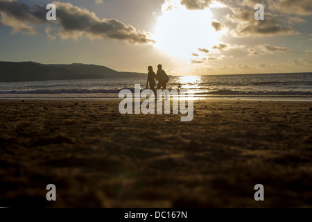 Lovers on the beach Stock Photo